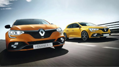 One Yellow and One Orange Renault Megane RS Racing