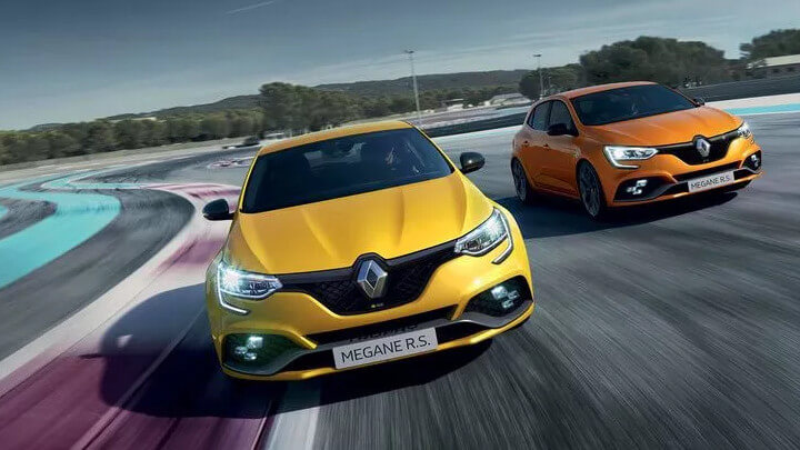 One Yellow and One Orange Renault Megane RS Racing