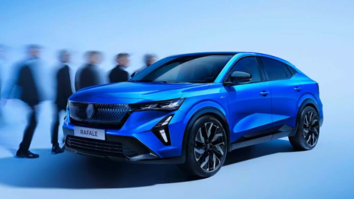 Blue Renault Rafale parked in a blue background