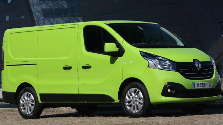 Yellow Renault Trafic Exterior Side on Gravel Road