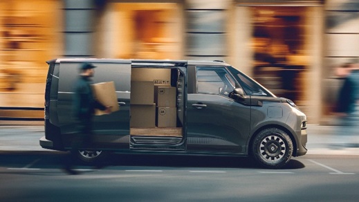 Renault Trafic Van E‑Tech electric van with side door open, showing cargo loading access