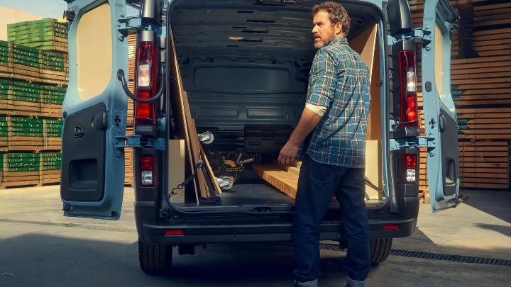 Renault Trafic rear cargo area with doors open, showing loading space for materials