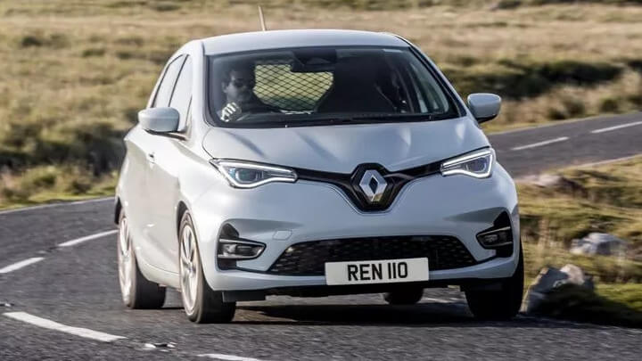 White Renault ZOE Van Driving Front