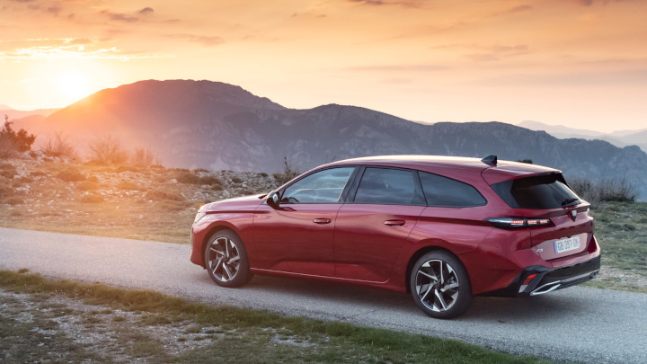 Red Peugeot 308 Exterior Rear Driving
