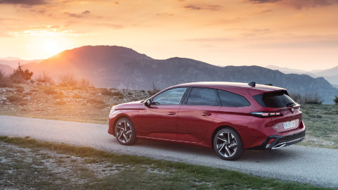 Red Peugeot 308 Exterior Rear Driving