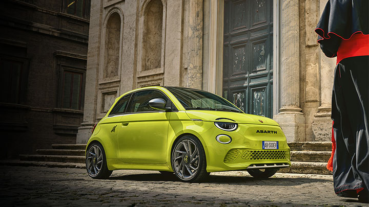 Yellow Abarth 500e Exterior Front Static in City
