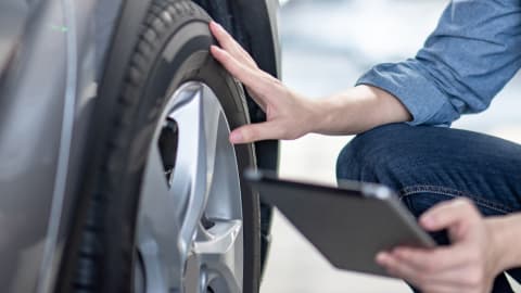 Vehicle health check being performed by technician