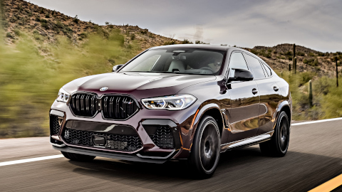 Purple BMW X6M Driving