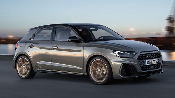 Grey Audi A1, driving