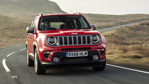 Red Jeep Renegade, driving in the countryside