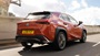 Orange Lexus UX Exterior Rear Driving