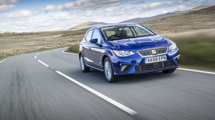 Blue SEAT Ibiza Driving