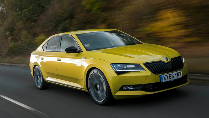 Yellow Skoda Superb Hatch Exterior Front Driving