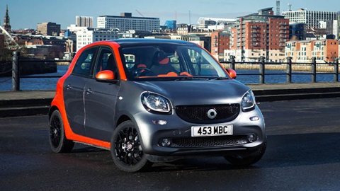 Grey and orange Smart ForFour, parked