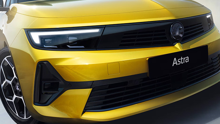 Yellow Vauxhall Astra Grille