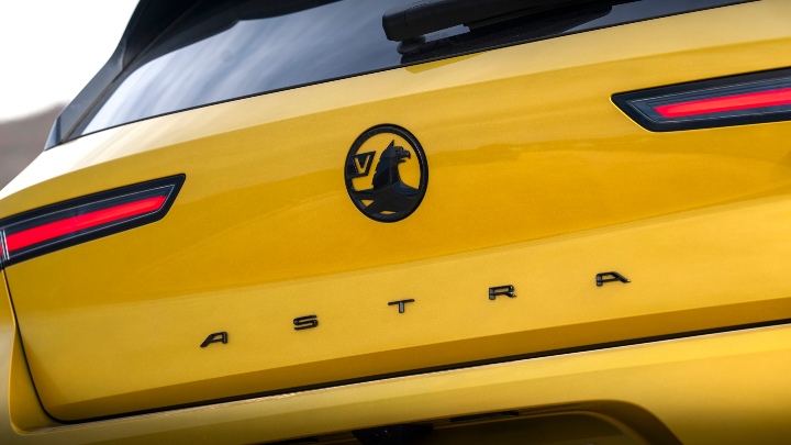 Yellow Vauxhall Astra rear boot close up