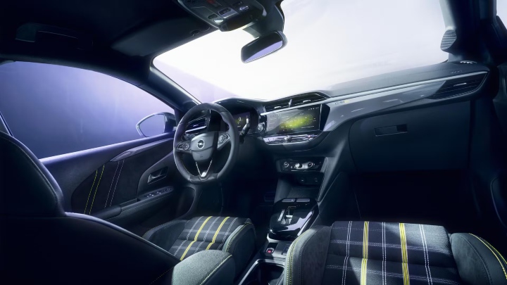 Vauxhall Corsa GSE interior featuring sports seats, digital displays and yellow contrast stitching