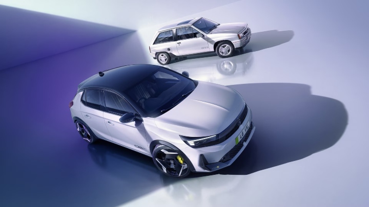 New Vauxhall Corsa GSE alongside a classic Vauxhall Nova Sport in a modern studio setting