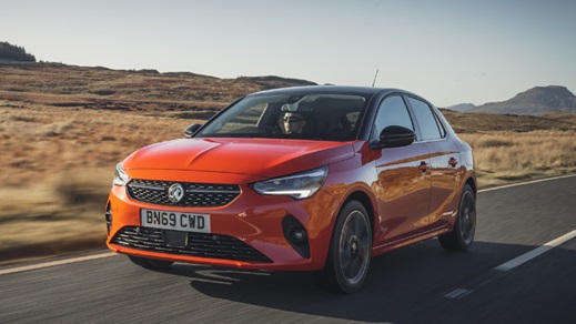 Orange Vauxhall Corsa Exterior Front Driving