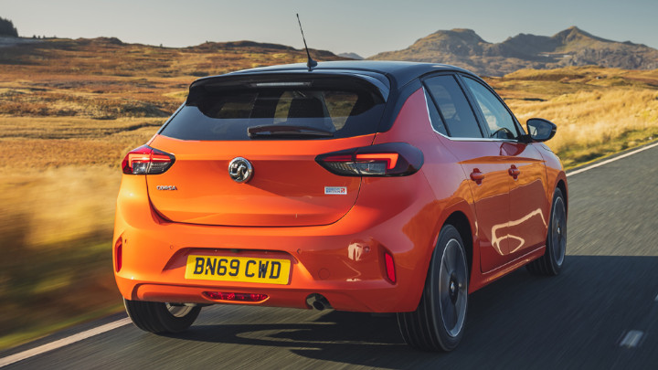 Orange Vauxhall Corsa Exterior Rear Driving
