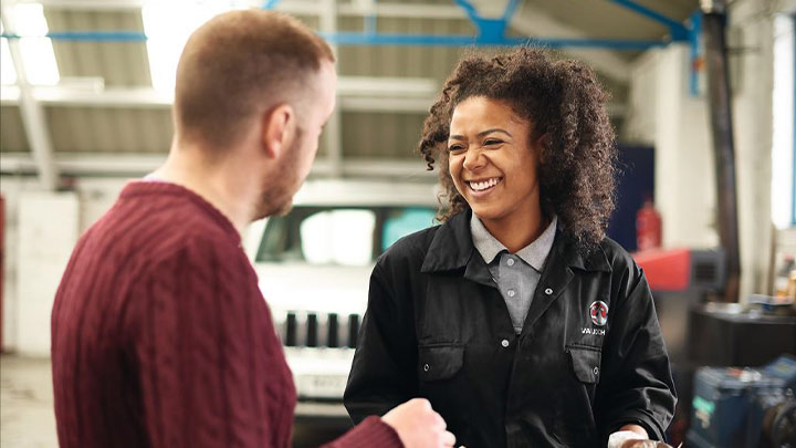 Vauxhall technician talking to a customer