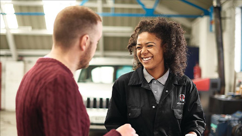 Vauxhall technician talking to a customer