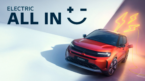 Red Vauxhall With Promotional Messaging