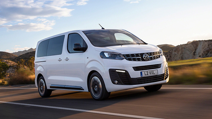 White Vauxhall Vivaro Life, driving