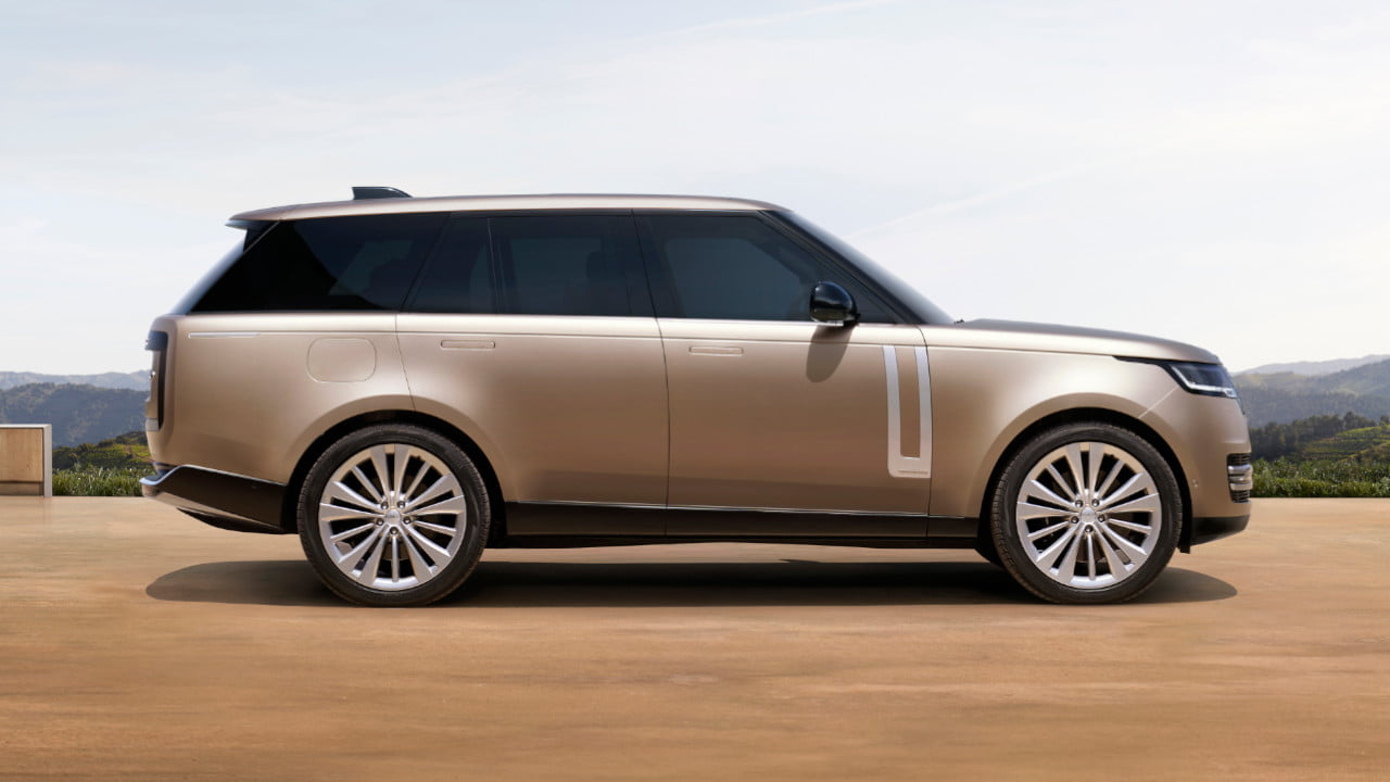 Range Rover in gold side view lifestyle