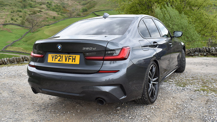 Grey BMW 3 Series, rear, parked