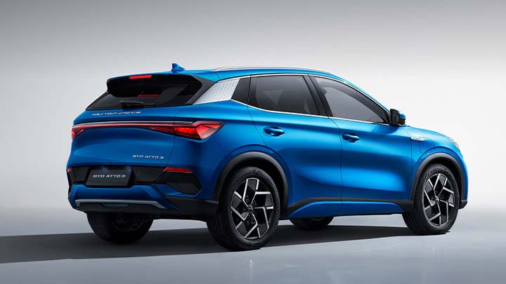 Blue BYD ATTO 3, studio shot, rear quarter angle