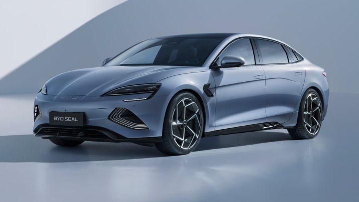 Side of a grey BYD Seal parked in a light grey background