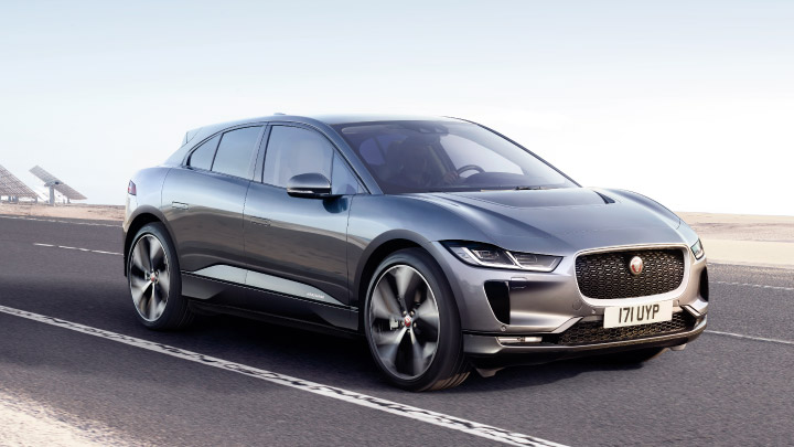 Gre Jaguar I Pace driving on the road.